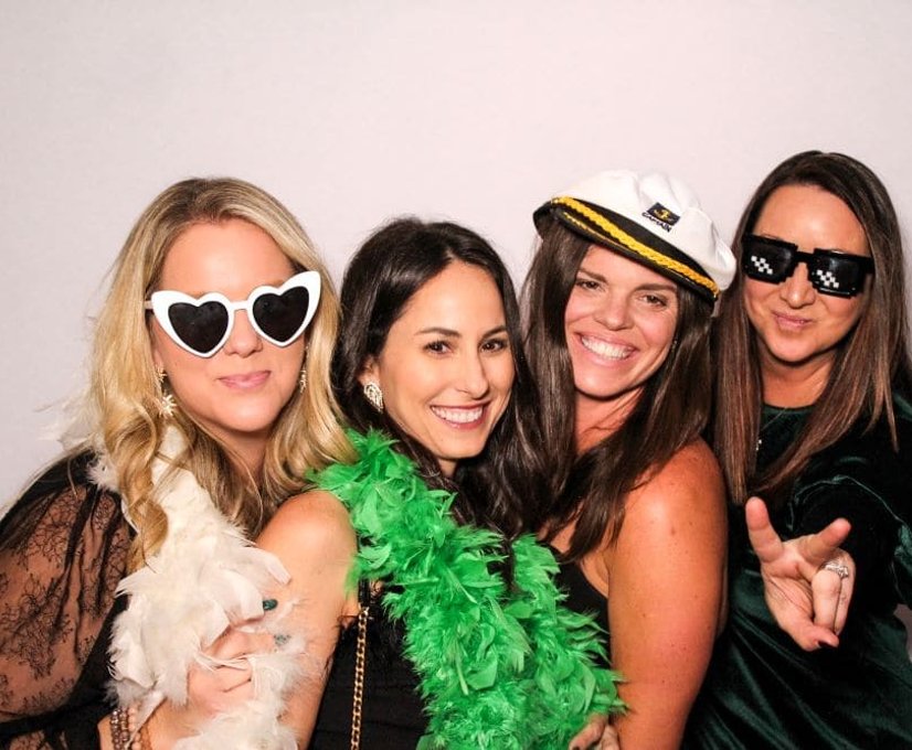 Group photo with photo booth backdrop